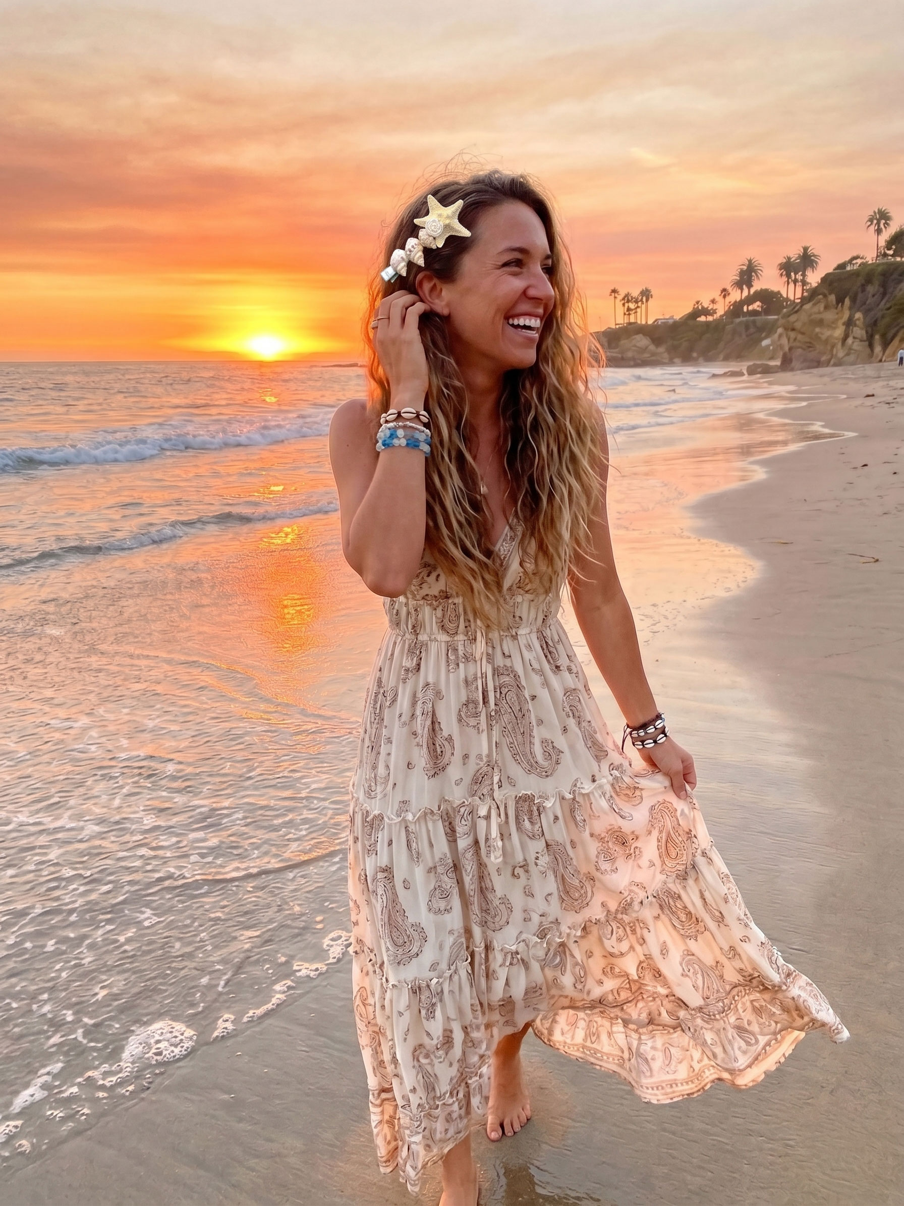 Girl walking down the beach wearing boho inspired beachwear